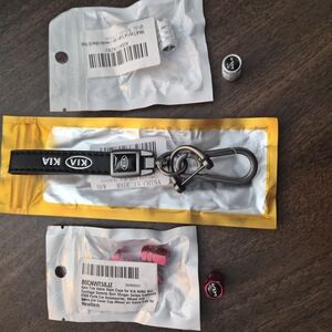 Kia Black Keychain with Tire Valve Cap Accessories